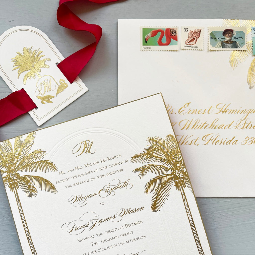 megan & trevor's gold engraved key west wedding invitations