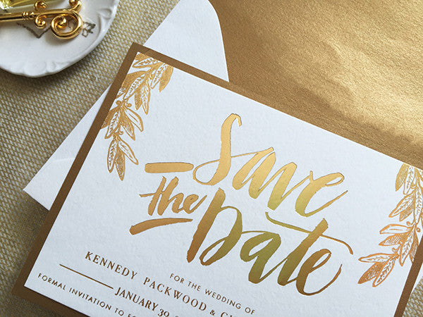 kennedy & christopher's hand-lettered gold foil save the dates