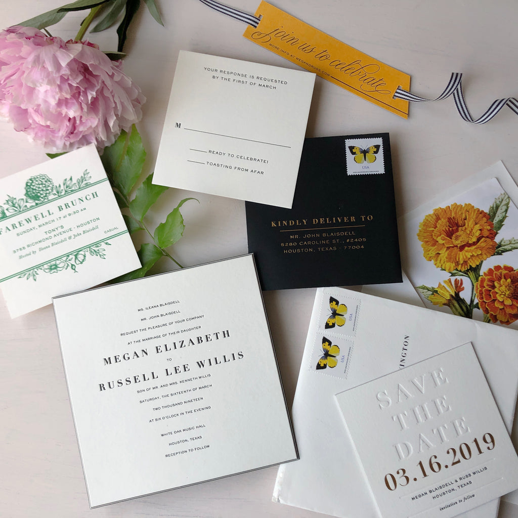 megan & russ's veuve clicquot-inspired wedding invitations